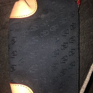 Dooney and Burke Black purse w/ red satin lining.